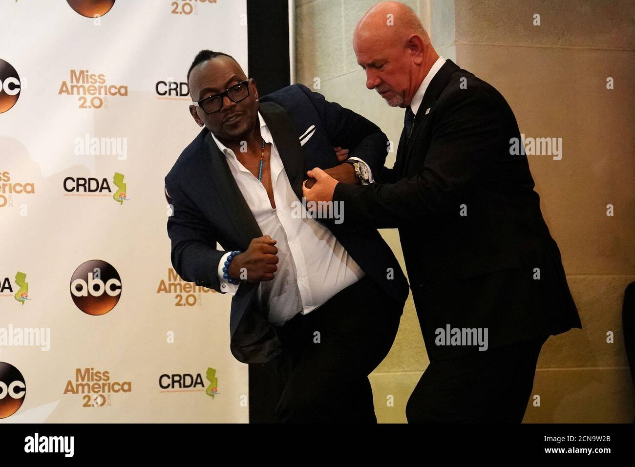 Randy Jackson is helped on the stage during a news conference by Miss New York Nia Imani Franklin in Atlantic City, New Jersey, U.S., September 9, 2018. REUTERS/Carlo Allegri Stock Photo