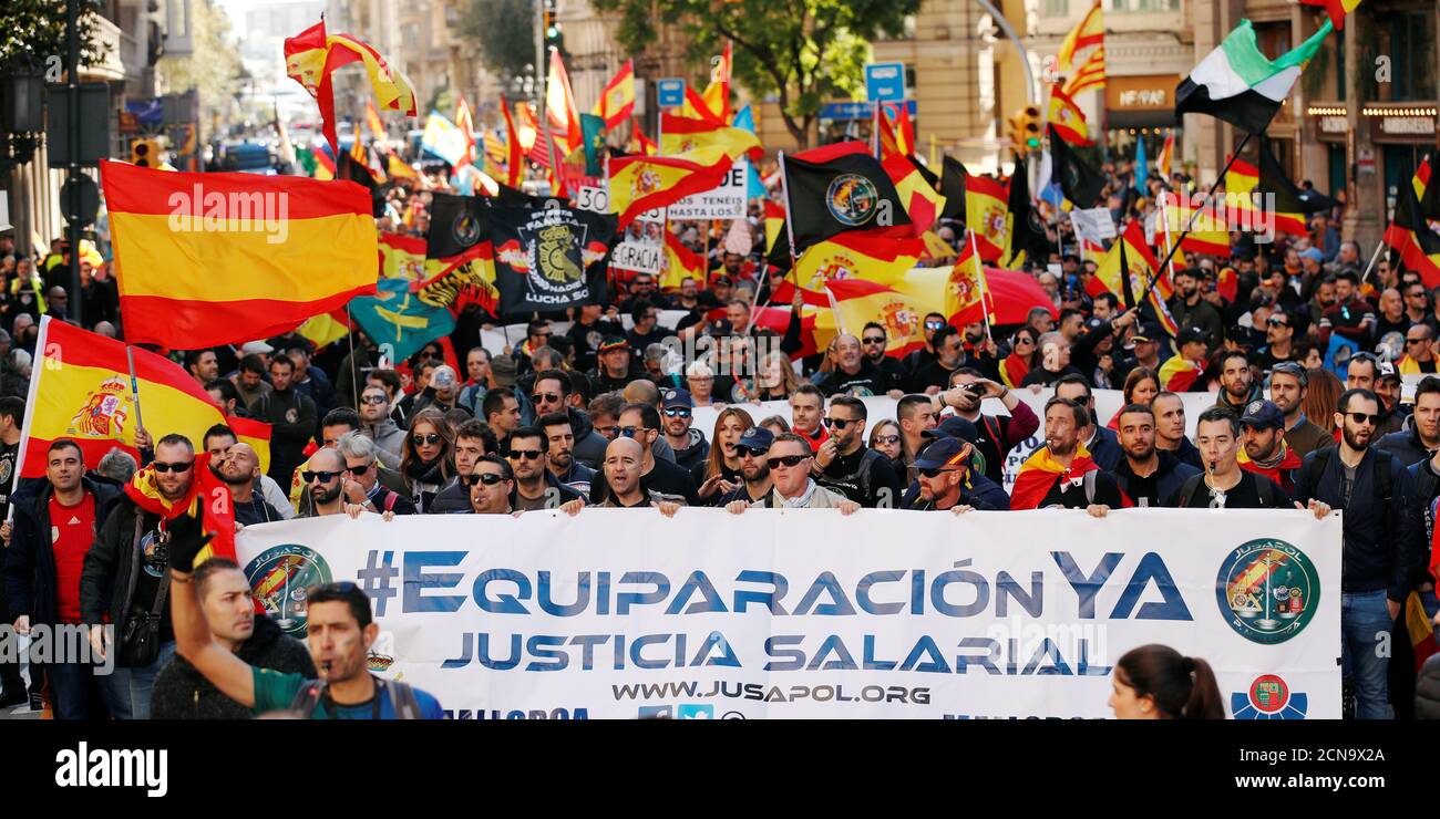 Members of Spanish police unions take part in a rally organised by Jusapol Foundation demanding better wages in Barcelona, Spain November 10, 2018. The banner reads 'Equalization already. Wage justice.' REUTERS/Albert Gea Stock Photo