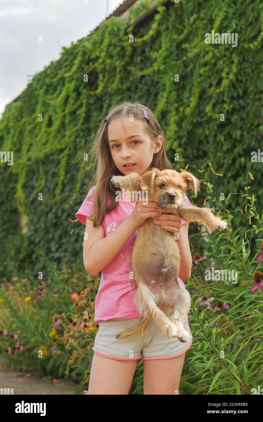 little-girl-and-mongrel-dog-outdoors-children-and-animals-girl-with