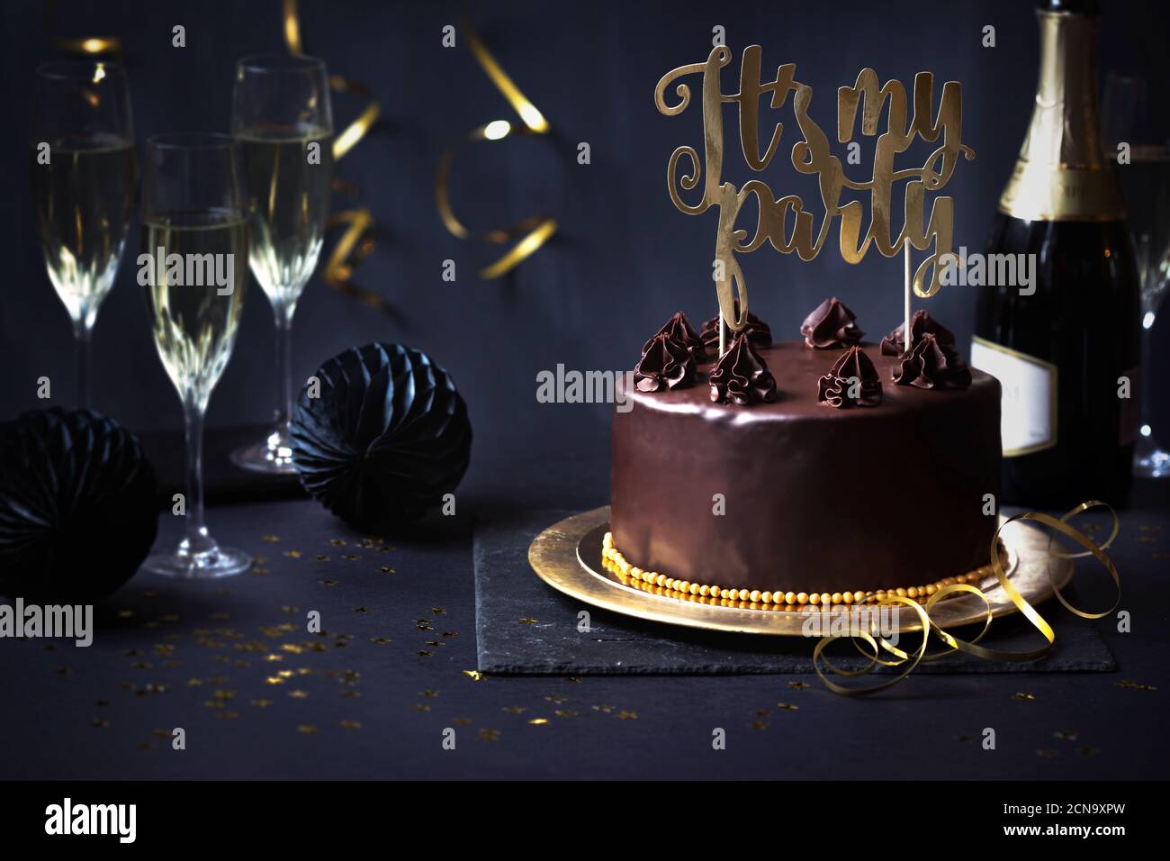 Chocolate Ganache Party Cake And Champagne In Black Gold Stock Photo Alamy Chocolate Ganache Party Cake And Champagne In Black Gold Stock Photo Alamy