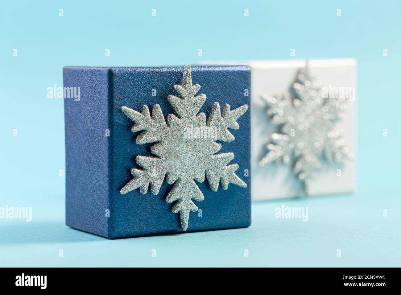 Abstract Christmas composition with cubes and snowflakes. Stock Photo