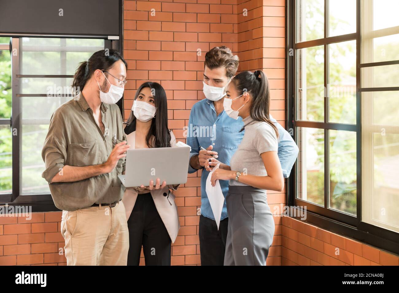 Businee person meeting with face mask Stock Photo - Alamy