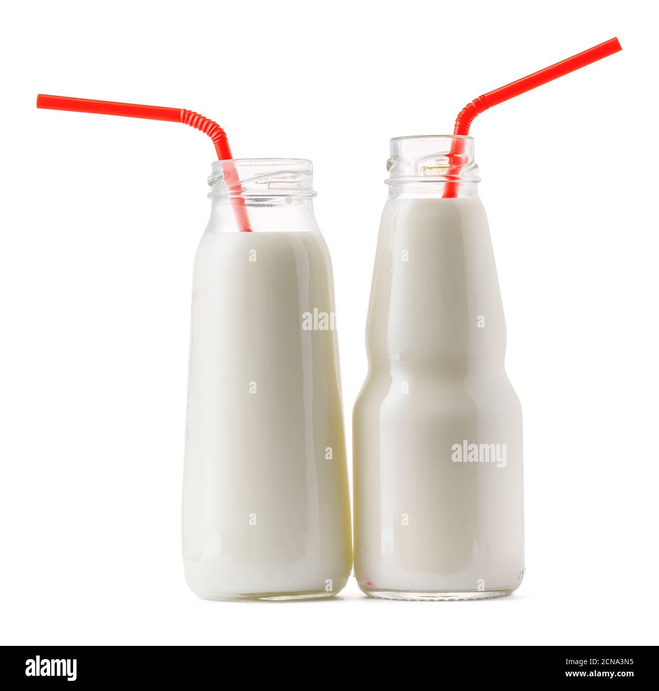 Glass cup of milk with a straw isolated on white Stock Photo Alamy