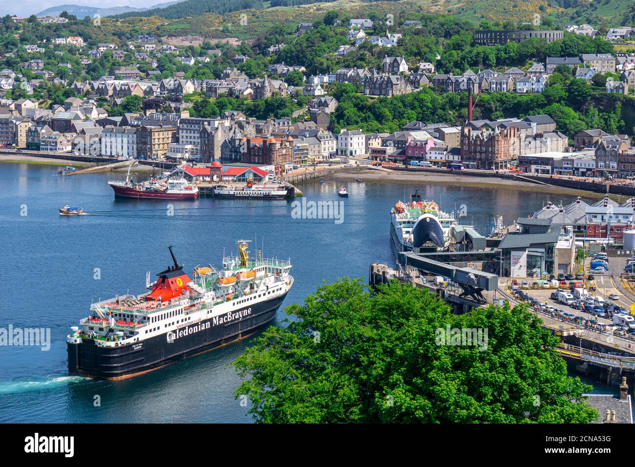Caledonian Macbrayne car and passenger ferry Isle of Mull arriving at the berth in harbour Oban Argyll & Bute Scotland from Mull Stock Photo