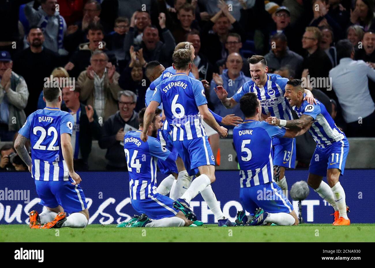 Soccer Football - Premier League - Brighton & Hove Albion v Manchester United - The American Express Community Stadium, Brighton, Britain - May 4, 2018   Brighton's Pascal Gross celebrates scoring their first goal with teammates   REUTERS/Eddie Keogh    EDITORIAL USE ONLY. No use with unauthorized audio, video, data, fixture lists, club/league logos or 'live' services. Online in-match use limited to 75 images, no video emulation. No use in betting, games or single club/league/player publications.  Please contact your account representative for further details. Stock Photo