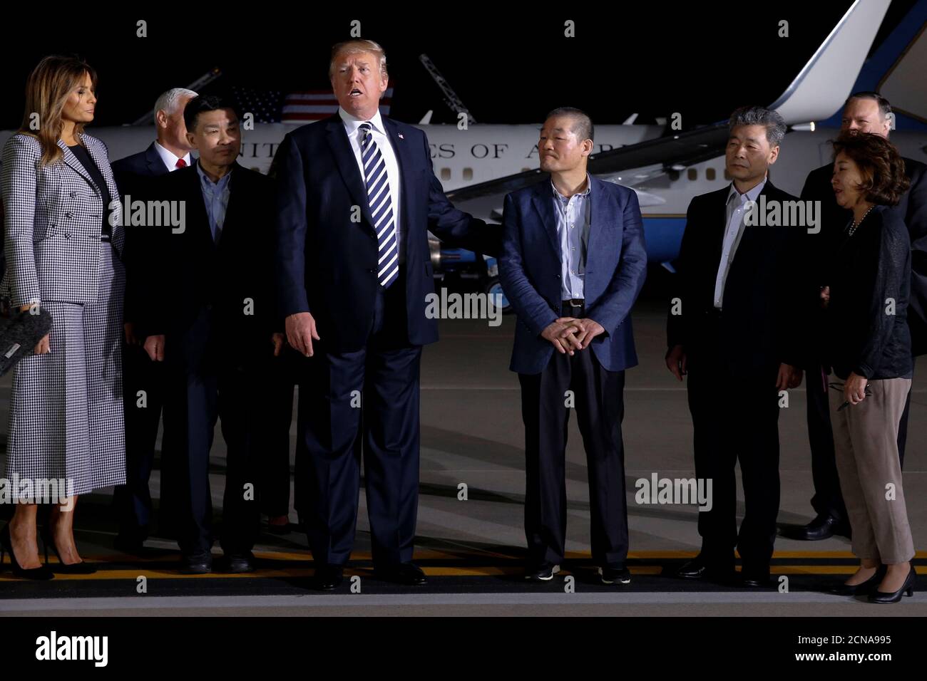 U.S.President Donald Trump speaks to the media next to the Americans released from detention in North Korea, Tony Kim, Kim Hak-song and Kim Dong-chul, upon their arrival at Joint Base Andrews, Maryland, U.S., May 10, 2018.  REUTERS/Jonathan Ernst Stock Photo
