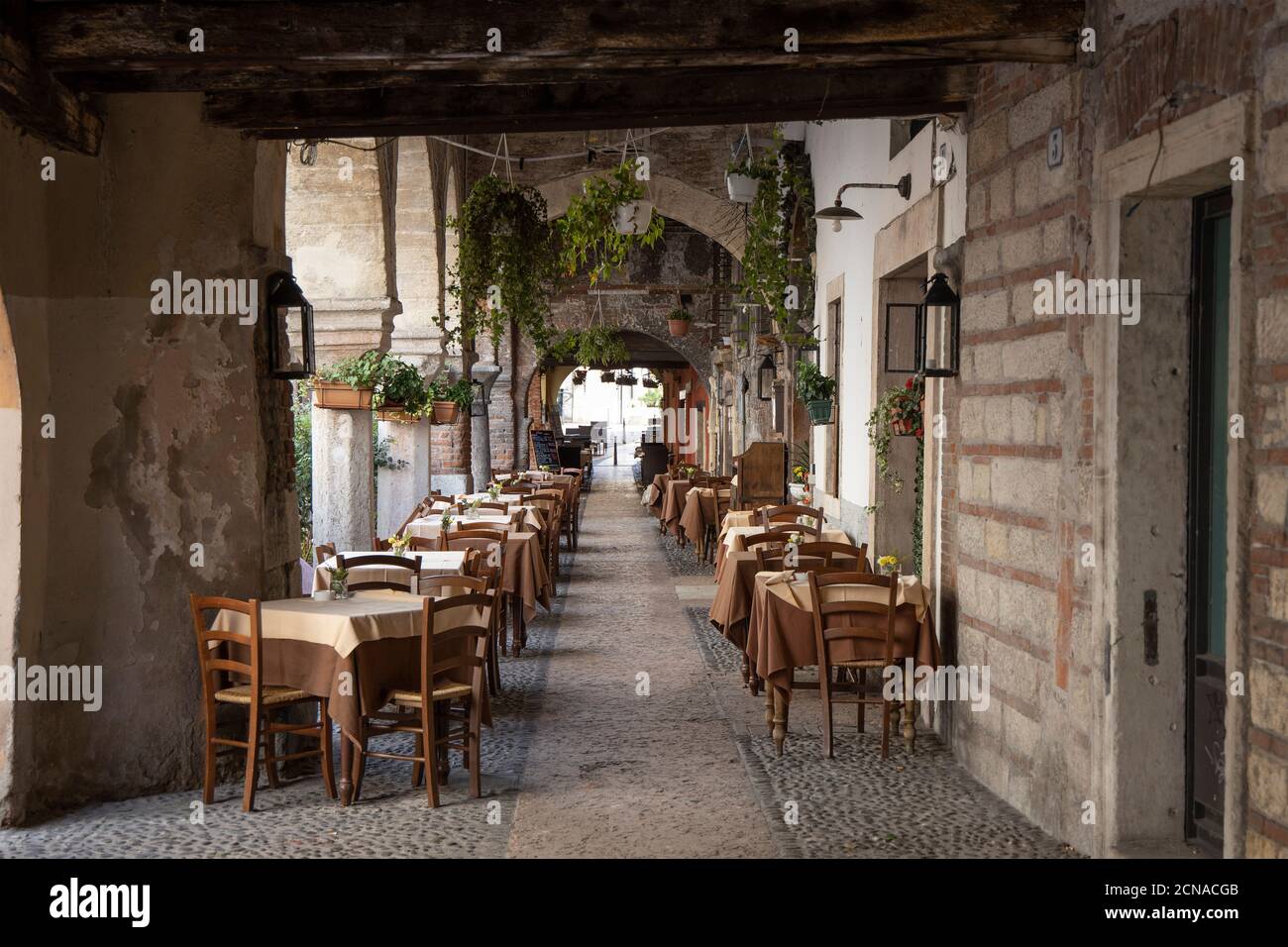 Empty restaurant Il Boccondivino in the old town Verona, Veneto, Italy, Europe. Stock Photo