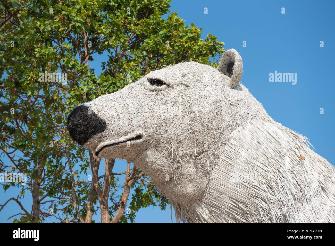 White bear statue made of straw. Stock Photo