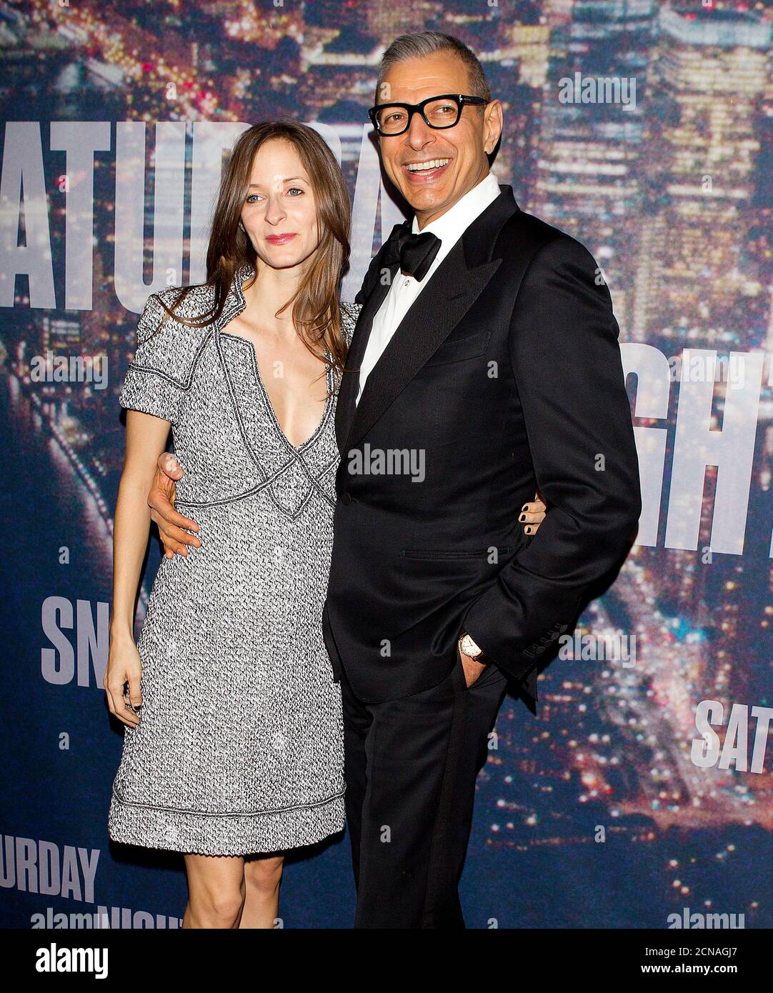 Actor Jeff Goldblum and his wife Emilie Livingston arrive for the 40th Anniversary Saturday Night Live (SNL) broadcast in the Manhattan borough of New York, February 15, 2015.       REUTERS/Carlo Allegri   (UNITED STATES - Tags: ENTERTAINMENT) Stock Photo