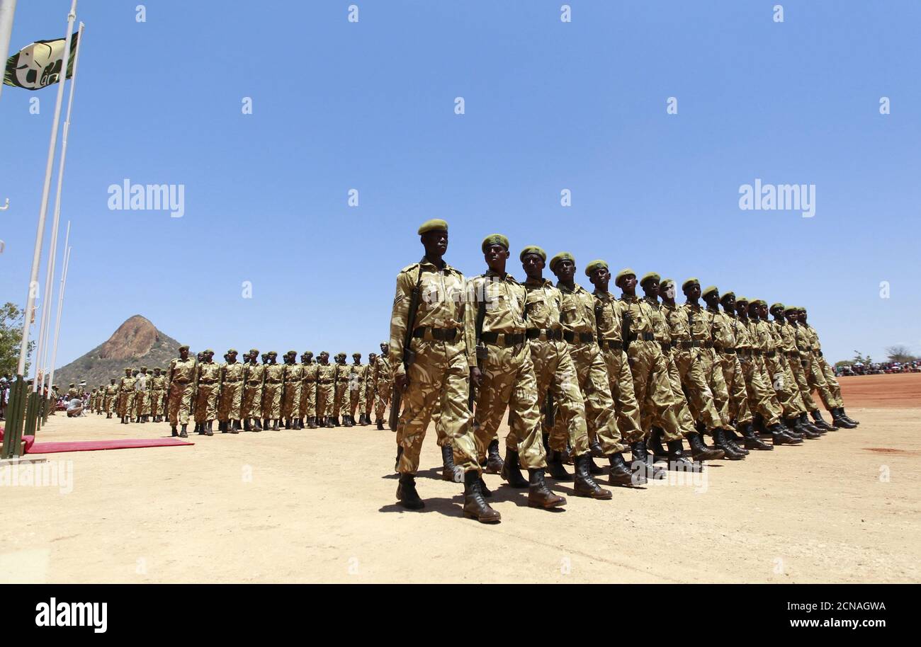 Kenya Wildlife Services (KWS) rangers parade during the passing out parade for 592 rangers at the Law Enforcement Academy Manyani in Tsavo West National Park, October 27, 2015. Kenya Wildlife Services Law Enforcement Academy conducts training programs for uniformed personnel including general security courses for staff from institutions outside the wildlife conservation fraternity especially to combat poaching, KWS officials said. Poaching has surged in the last few years across sub-Saharan Africa, where gangs kill elephants and rhinos to feed Asian demand for ivory and horns for use in folk m Stock Photo