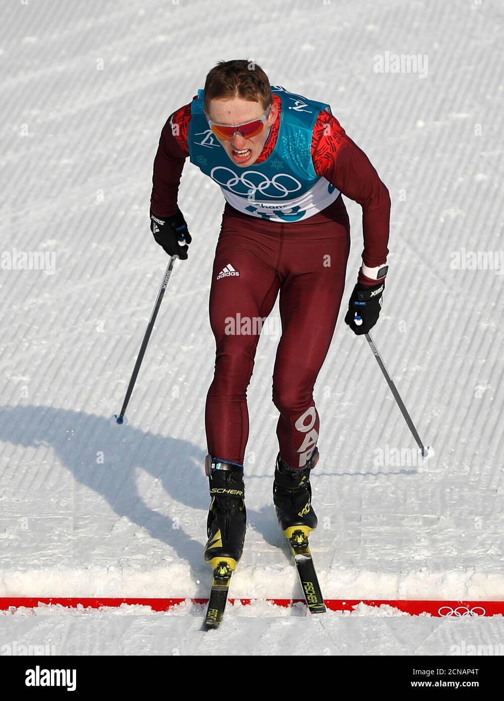 Cross-Country Skiing – Pyeongchang 2018 Winter Olympics – Men's 15km Free – Alpensia Cross-Country Skiing Centre – Pyeongchang, South Korea – February 16, 2018 - Denis Spitsov, an Olympic athlete from Russia, crosses the finish line. REUTERS/Murad Sezer Stock Photo