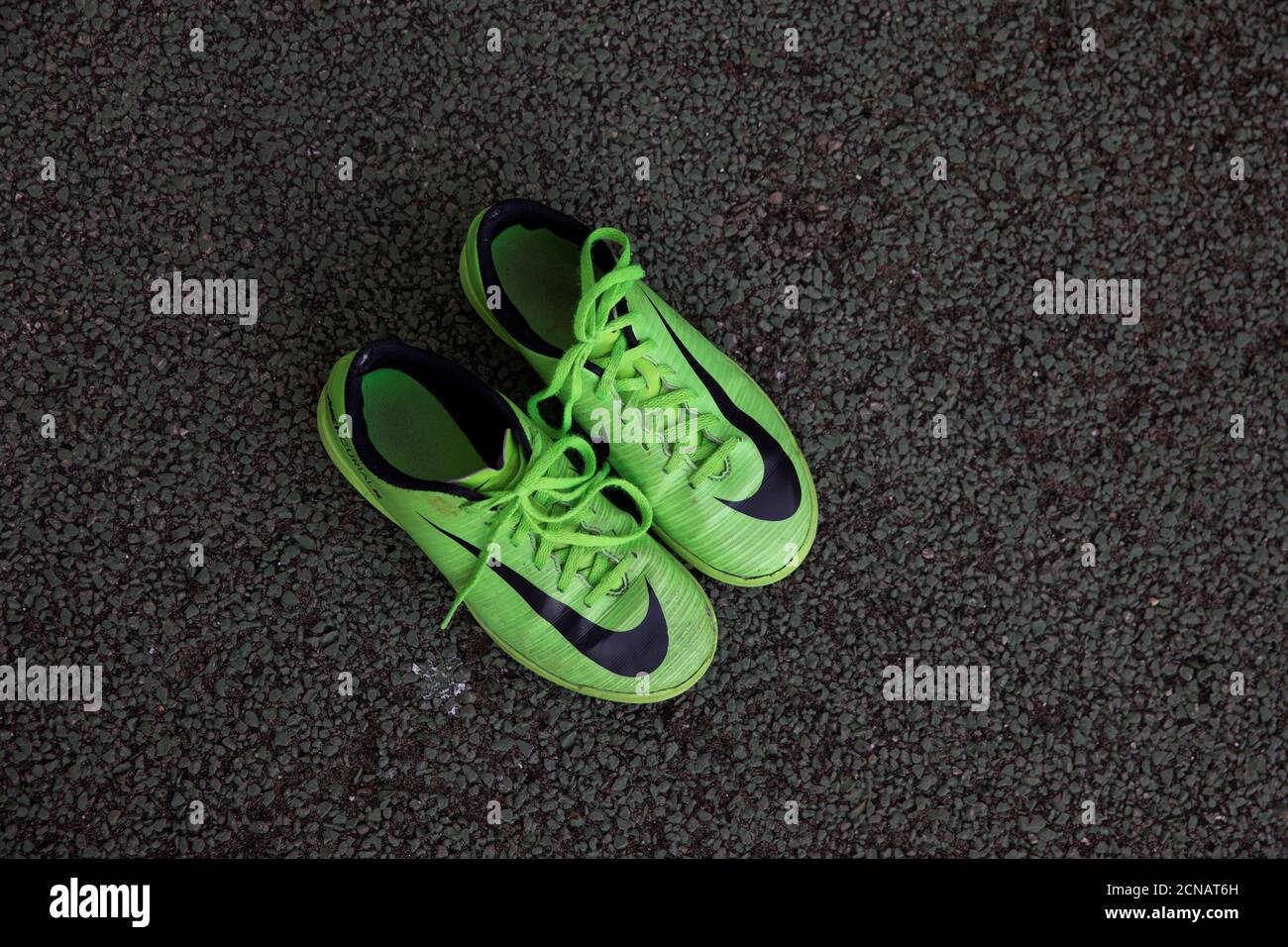 Football boots lie on the pitch hi-res stock photography and images - Alamy