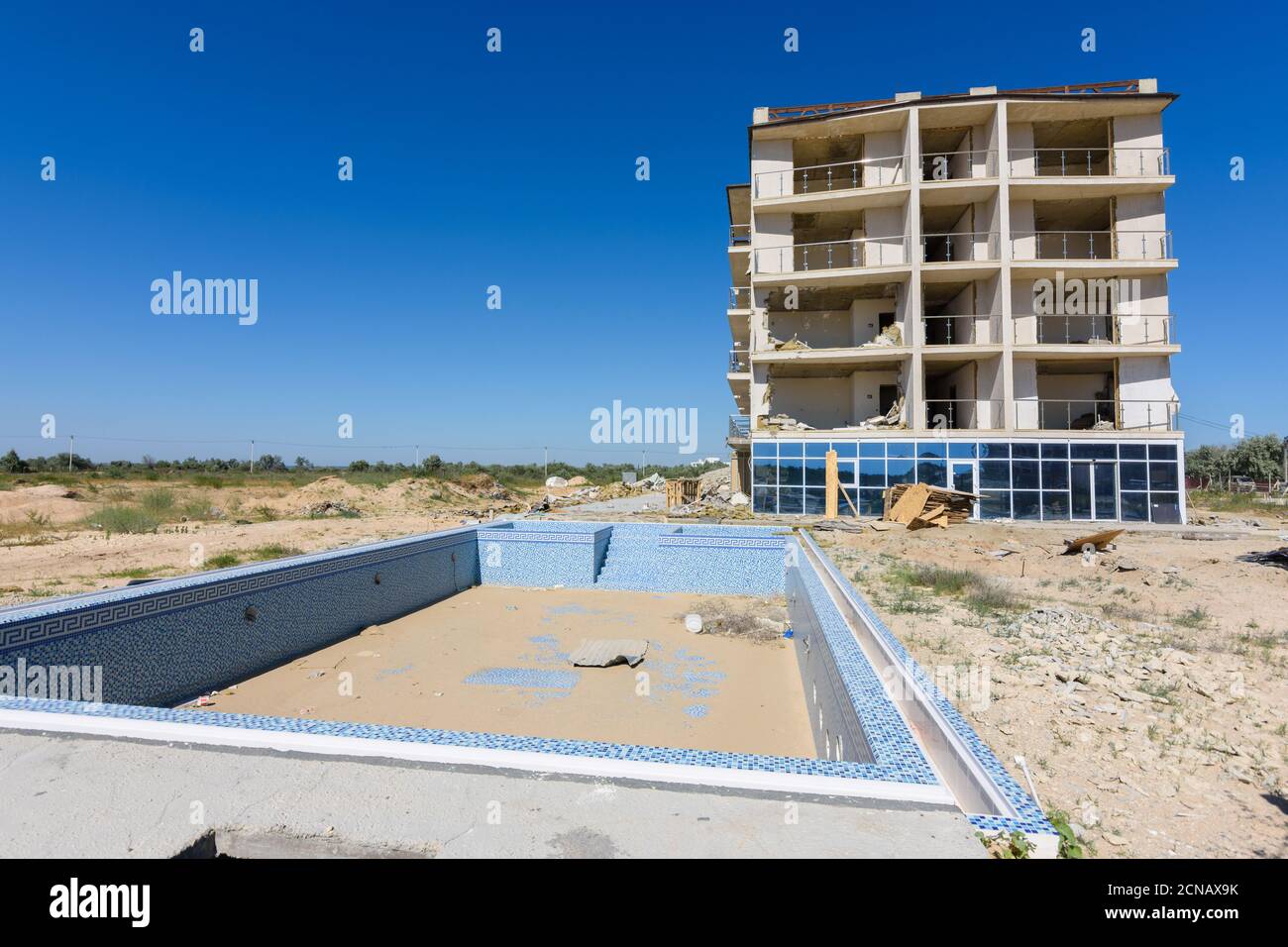 Illegal construction on the coastal side, demolition of the hotel building Stock Photo