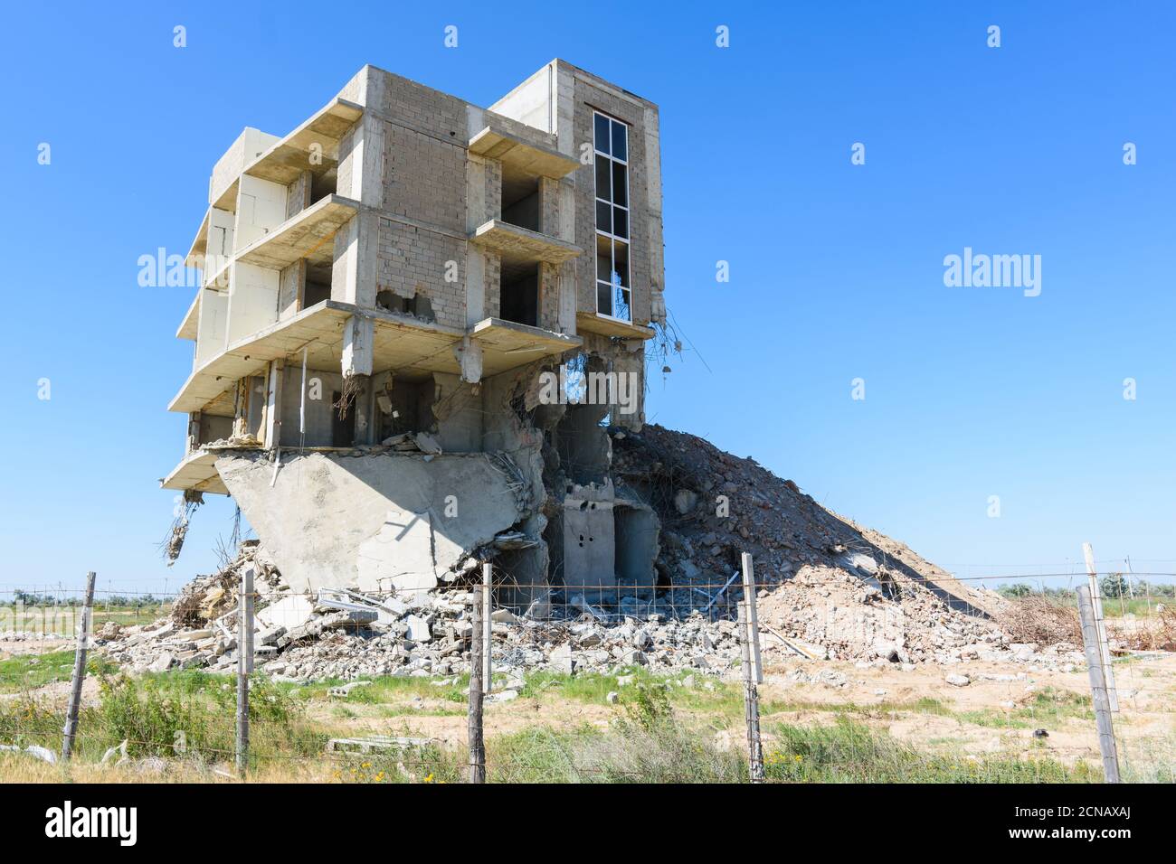 Illegal construction on the coastal side, hotel demolition Stock Photo