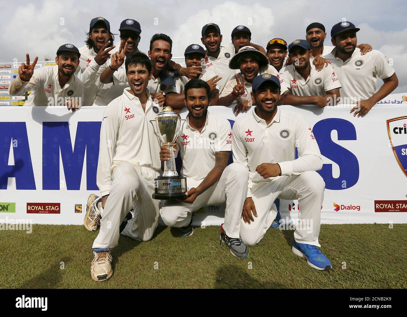 Indian cricket team members poses for photographs with the trophy after they won their final test cricket match and the series against Sri Lanka in Colombo, September 1, 2015. REUTERS/Dinuka Liyanawatte Stock Photo