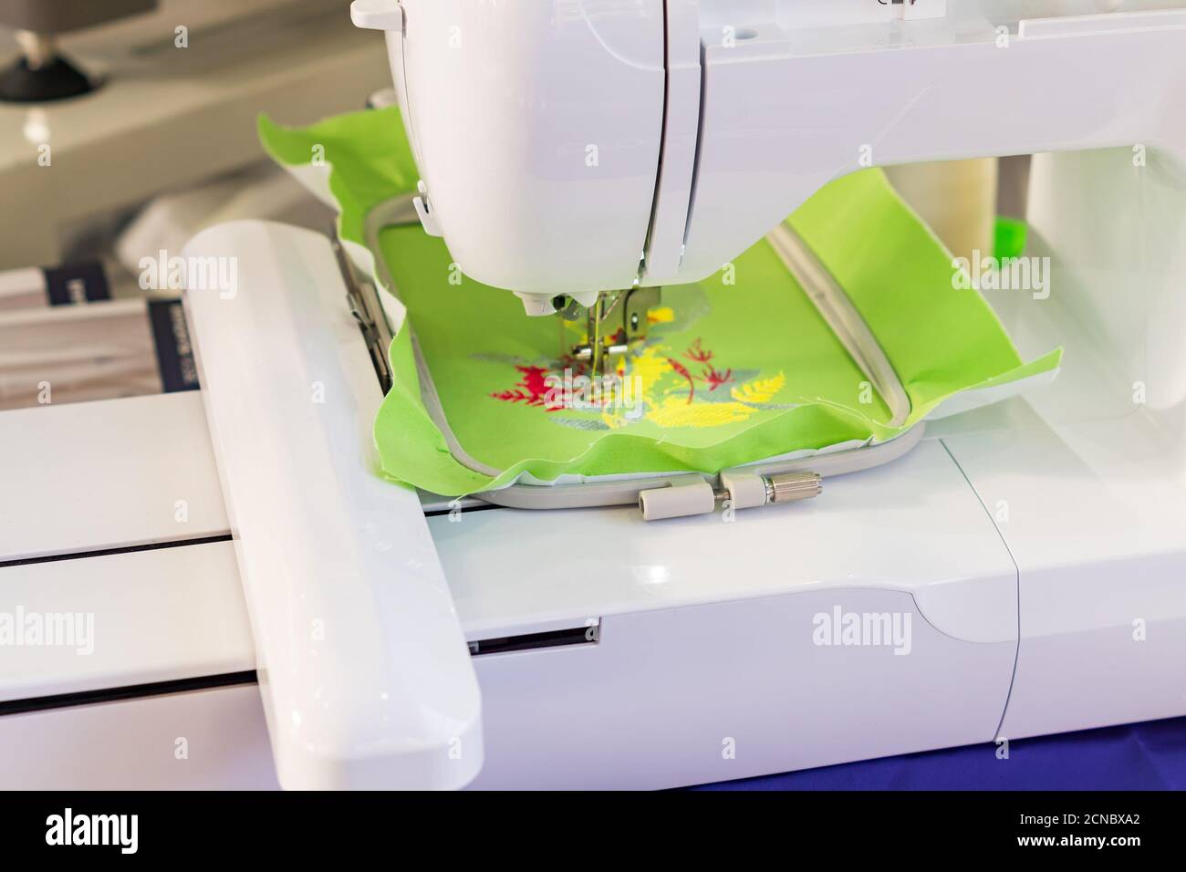Sewing machine close up. Process of automatic embroidery Stock Photo