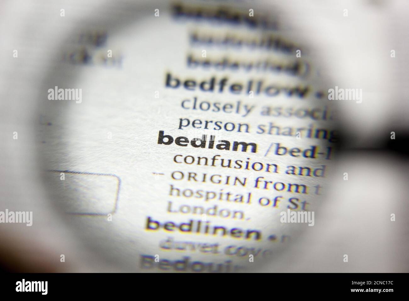 The word or phrase Bedlam in a dictionary Stock Photo
