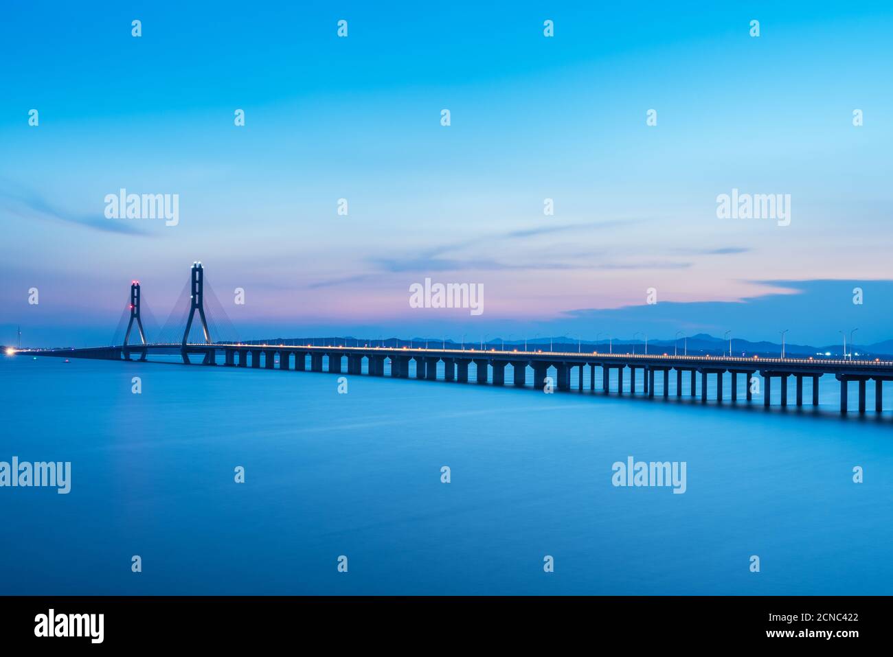 cable-stayed bridge in nightfall Stock Photo