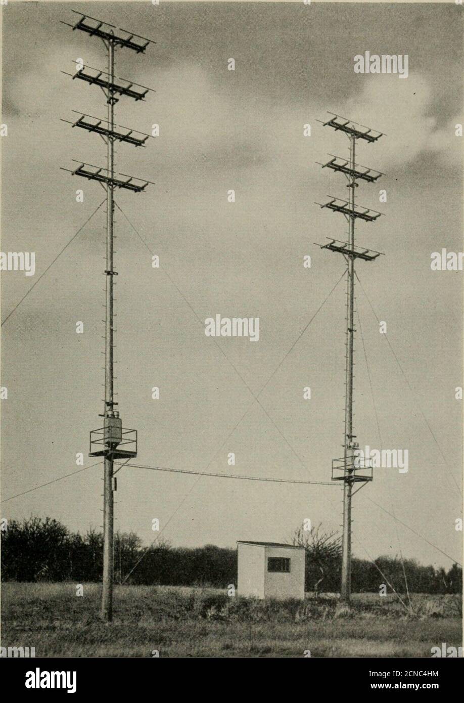 The Bell System technical journal . Fig. 4—Ultra-short-wave receiver  mounted in metal containersuitable for pole mounting. impedance. This is  well in excess of the power required during normaloperation. The  transmitting and