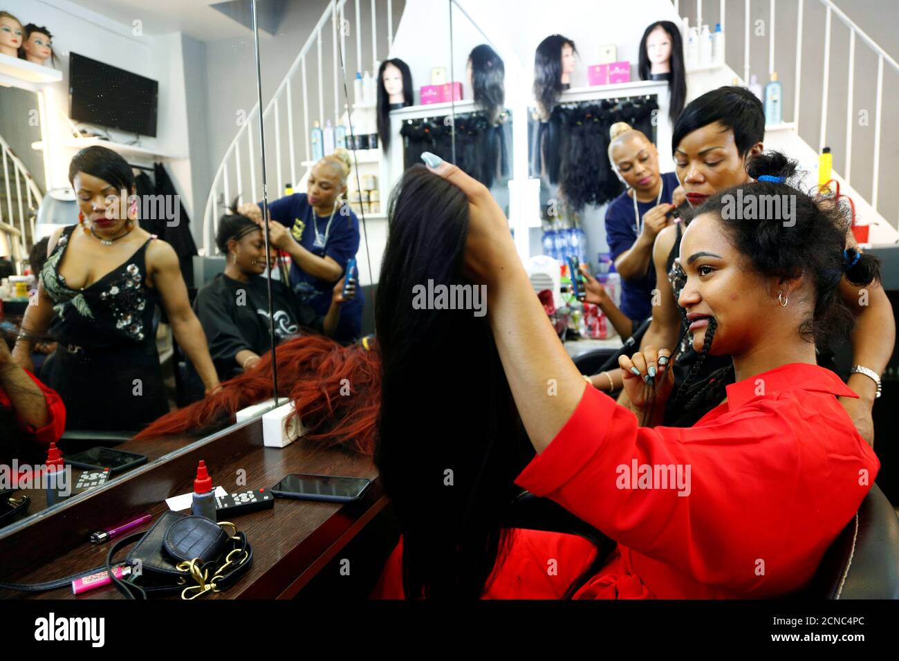 Belgian-Congolese influencer and model Vanessa Caixeiro is pictured in a hair  salon of the Matonge gallery in Brussels, Belgium, June 13, 2020. Picture  taken June 13, 2020. REUTERS/Francois Lenoir Stock Photo - Alamy