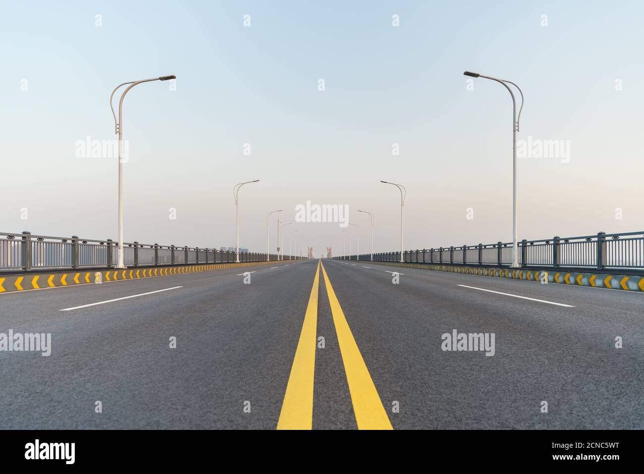 empty asphalt road surface on bridge Stock Photo