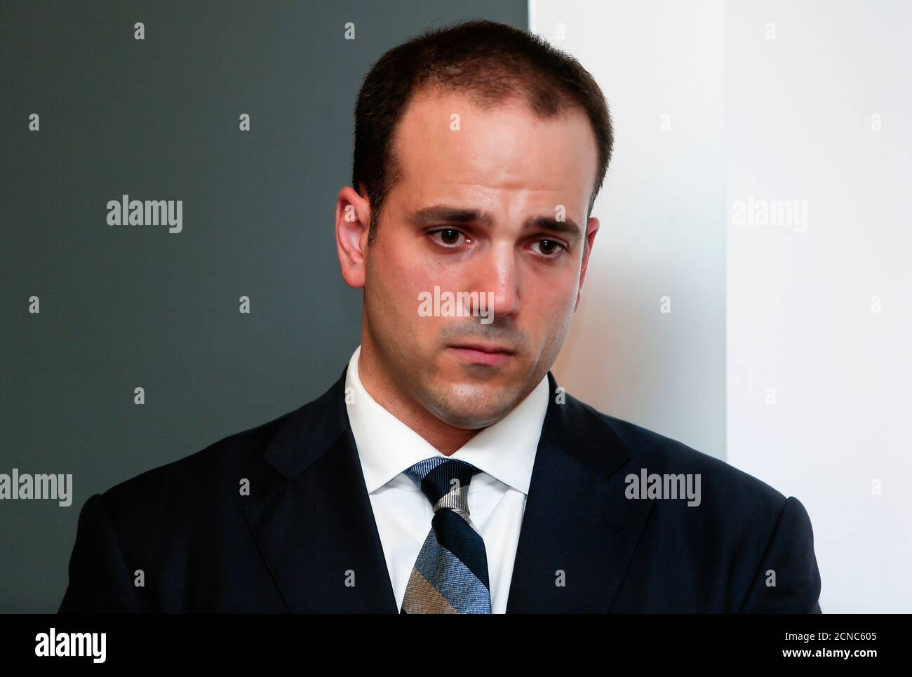Michael Kobold, spokesperson of Gandolfini family, looks down during a news conference about James Gandolfini's death in Rome June 20, 2013. Gandolfini, the burly actor best known for his Emmy-winning portrayal of a conflicted New Jersey mob boss in the groundbreaking TV series 'The Sopranos,' died on Wednesday vacationing in Italy. He was 51. REUTERS/Yara Nardi (ITALY - Tags: OBITUARY ENTERTAINMENT) Stock Photo