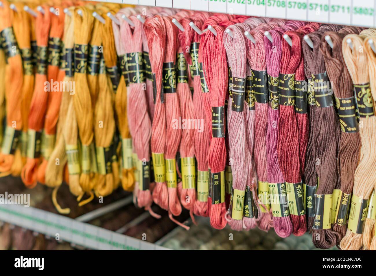 Moscow, Russia - February 14, 2019: Stend of Embroidery Floss in a shop. Colorfull textrure background Stock Photo
