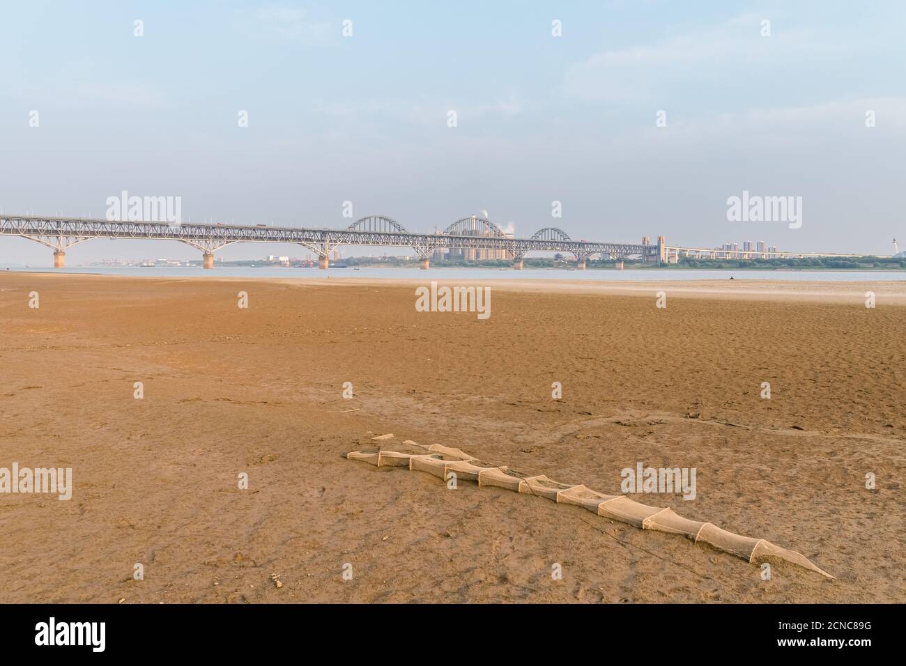 river beach and jiujiang bridge Stock Photo