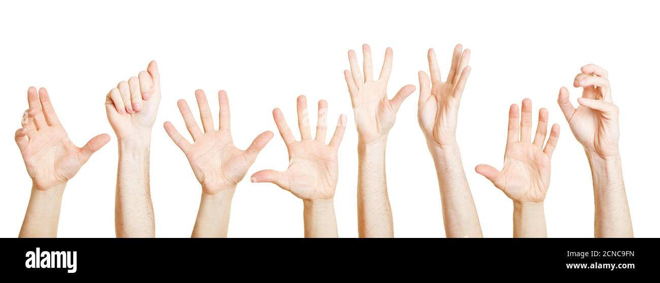 Many different hands reach up desperately Stock Photo