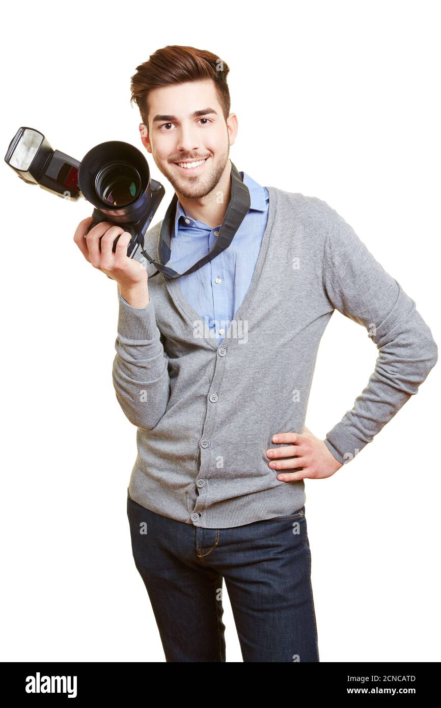 Young wedding photographer smiles with professional camera and flash Stock Photo