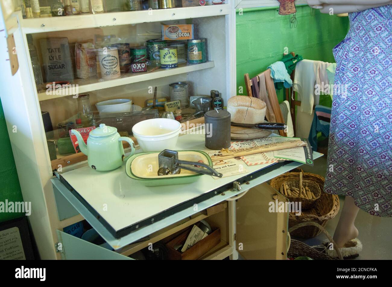 An exhibit showing a typical lifestyle and products in a wartime