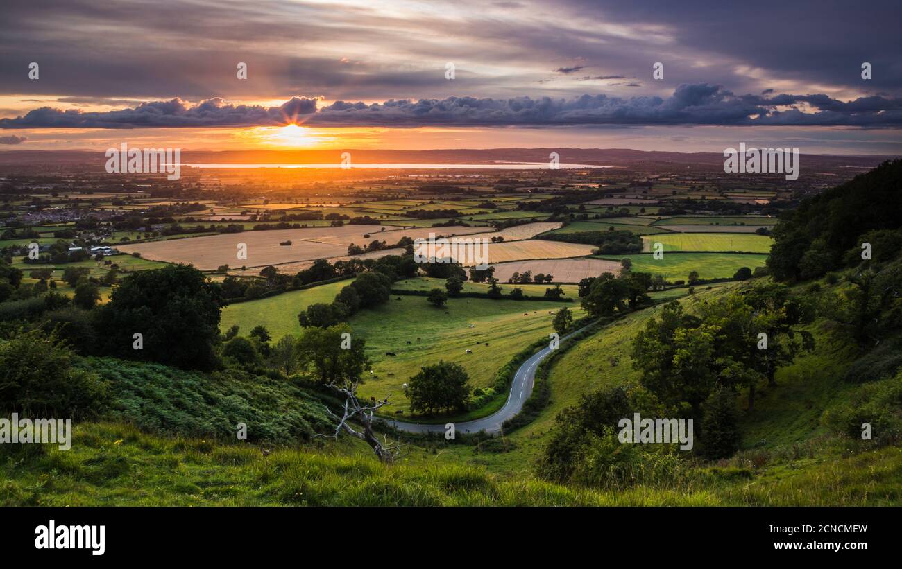 Summer sunset over the Severn Vale viewed from Coaley Peak, Gloucestershire. Stock Photo