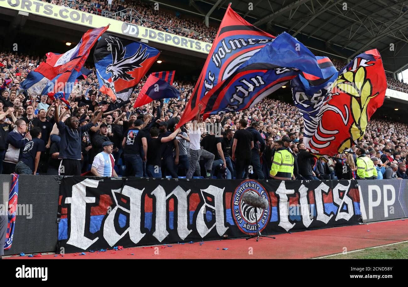 Soccer Football - Premier League - Crystal Palace vs West Bromwich Albion - Selhurst Park, London, Britain - May 13, 2018 Crystal Palace fans during the match REUTERS/Hannah McKay EDITORIAL USE ONLY. No use with unauthorized audio, video, data, fixture lists, club/league logos or "live" services. Online in-match use limited to 75 images, no video emulation. No use in betting, games or single club/league/player publications. Please contact your account representative for further details. Stock Photo