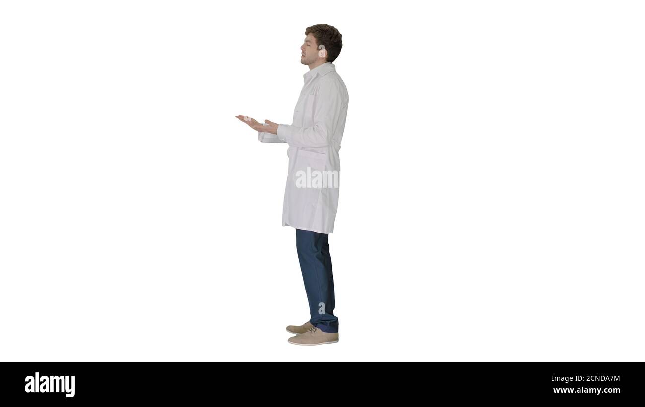Doctor wearing white coat explaining something on white backgrou Stock ...