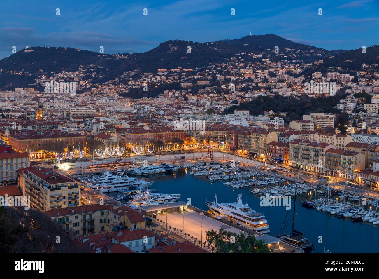 Elevated view from Castle Hill down to Port Lympia at dusk, Nice, Alpes Maritimes, Cote d'Azur, French Riviera, Provence, France, Mediterranean Stock Photo