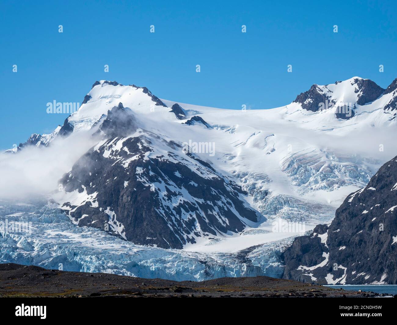 Snow-covered mountains and glaciers in King Haakon Bay, South Georgia, Polar Regions Stock Photo
