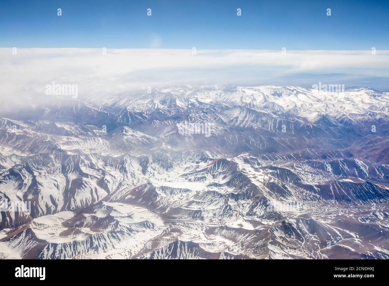 Aerial view of the snowcapped Andes Mountain Range, Chile Stock Photo