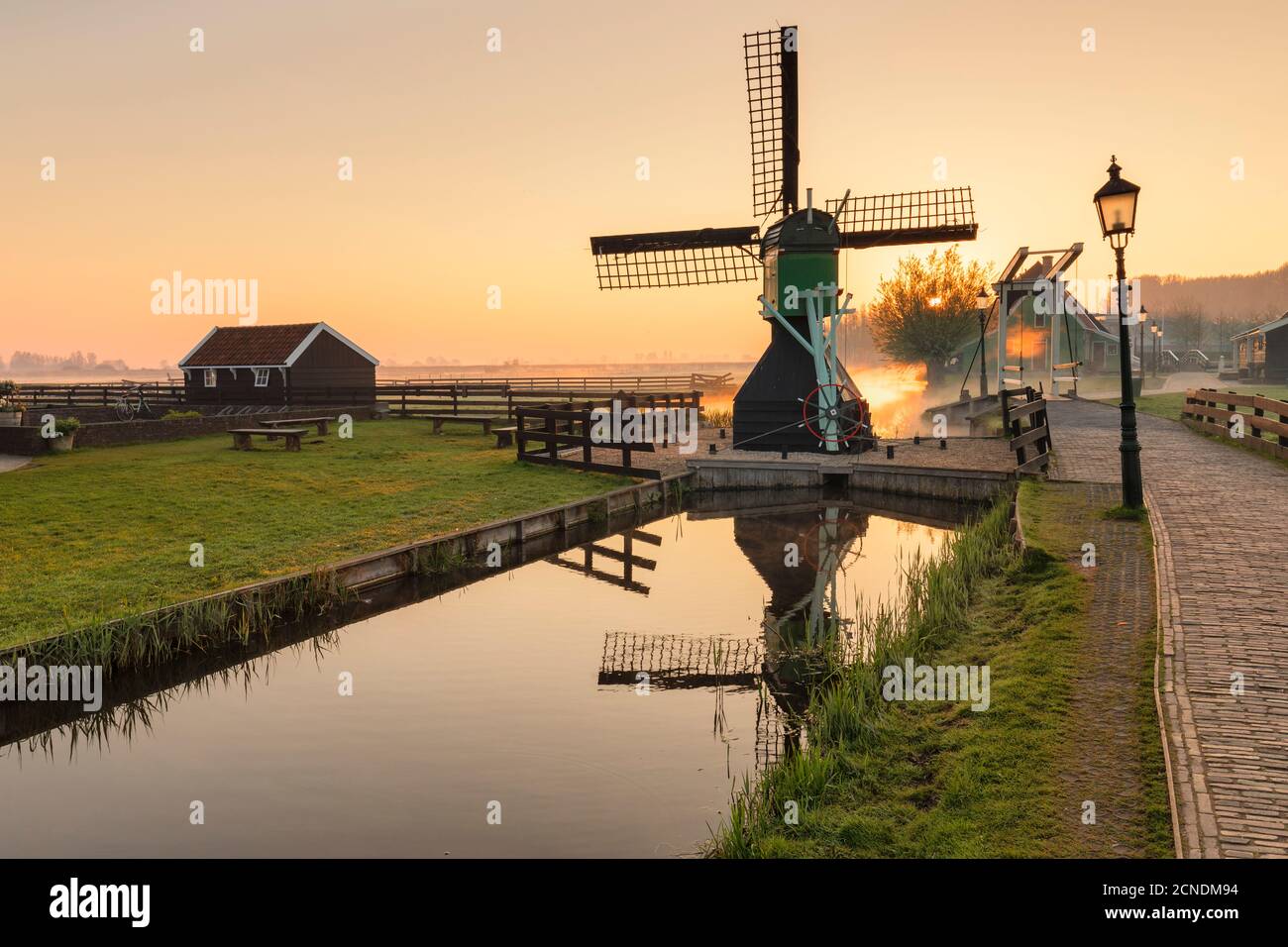 Traditional village at sunrise, Zaanse Schans, Zaandam, North Holland, Netherlands, Europe Stock Photo