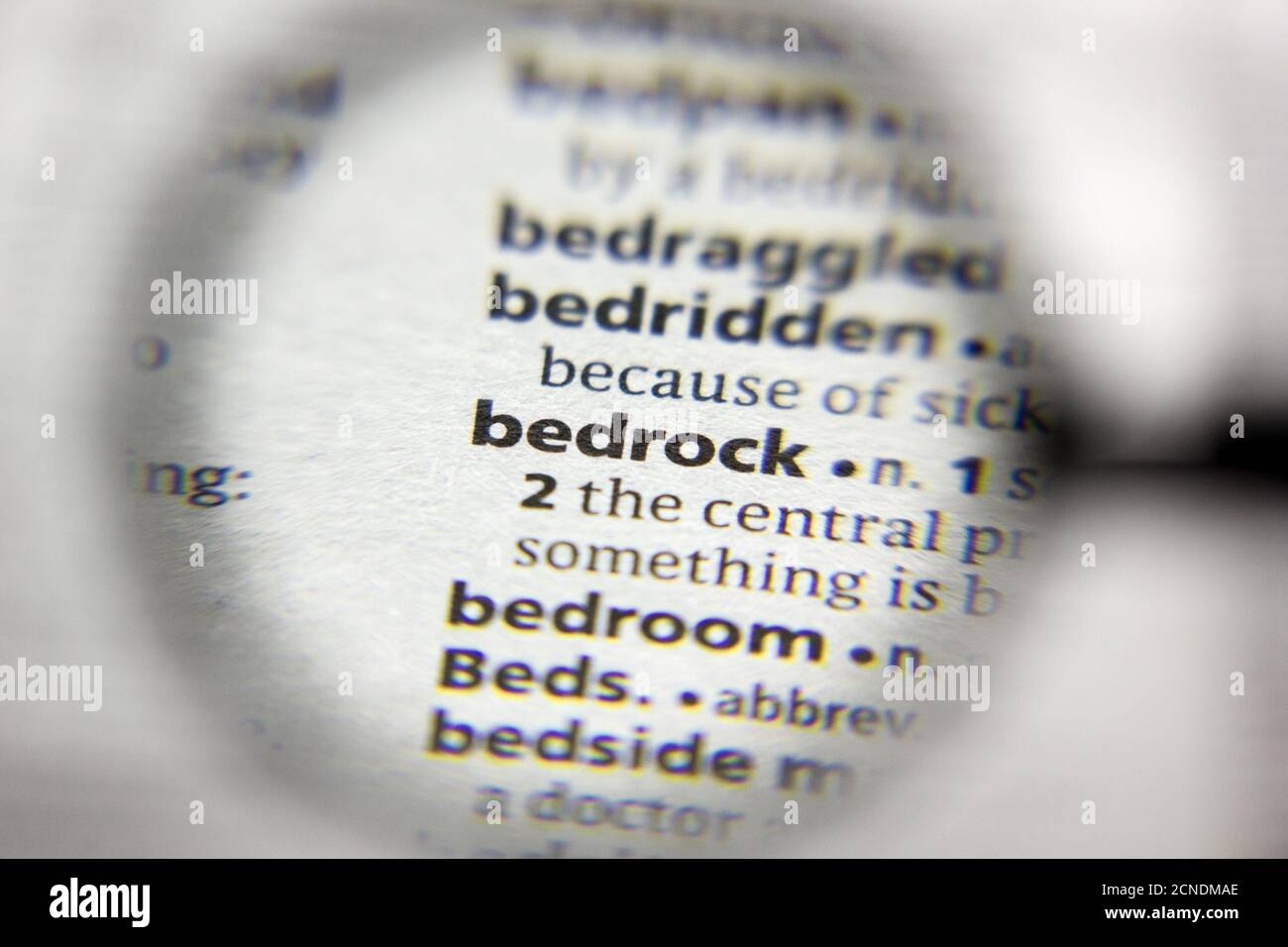 The word or phrase Bedrock in a dictionary Stock Photo Alamy