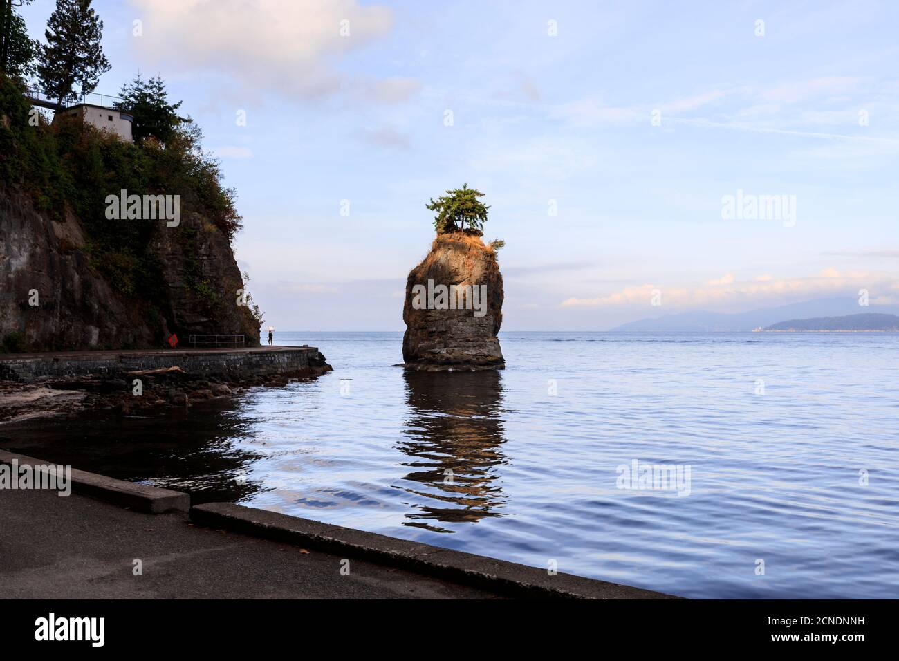 Siwash Rock and Stanley Park Seawall, Vancouver City, British Columbia, Canada Stock Photo