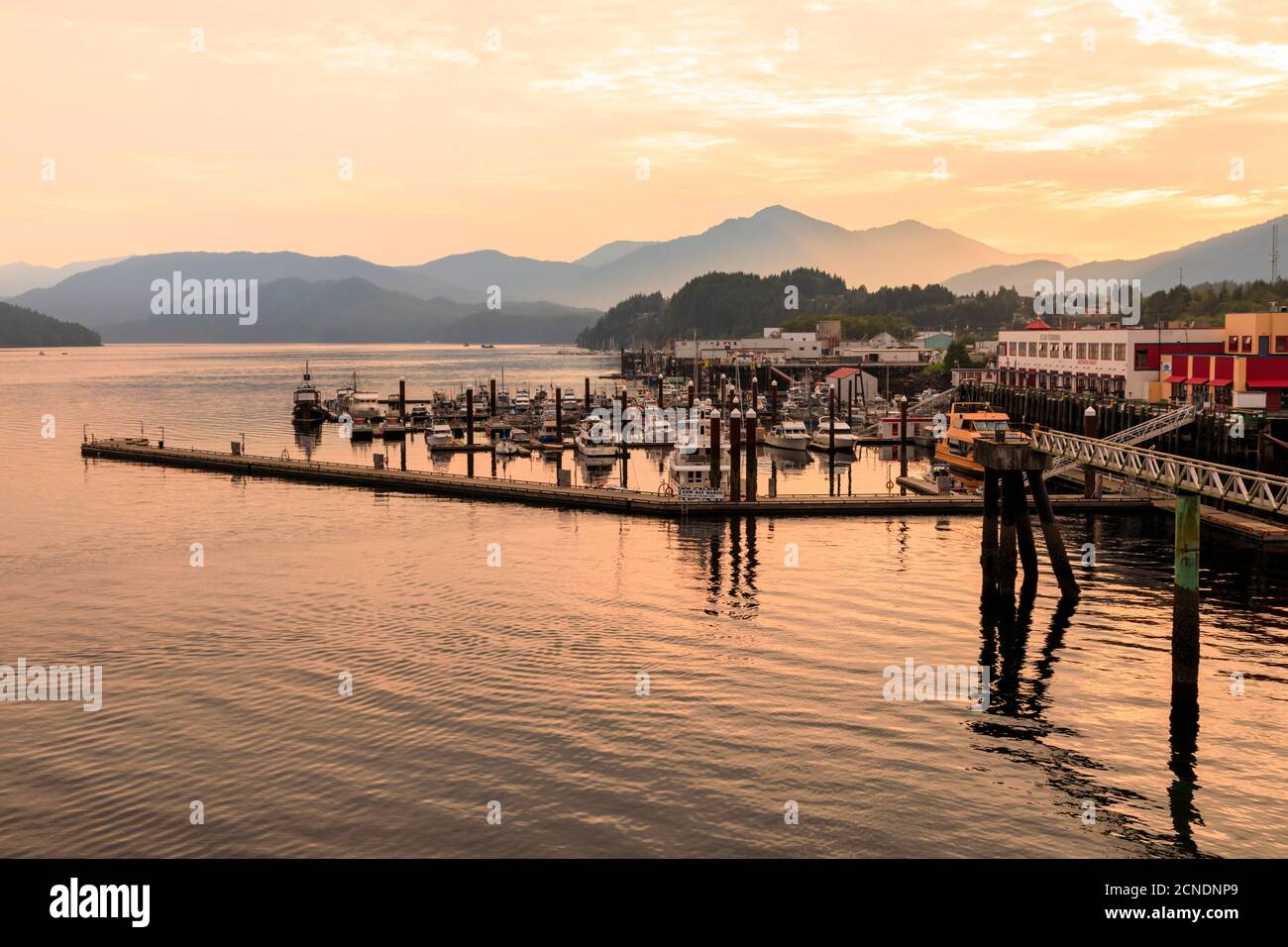 Misty sunrise, waterfront and mountains of Prince Rupert, Inside Passage, North West British Columbia, Canada Stock Photo