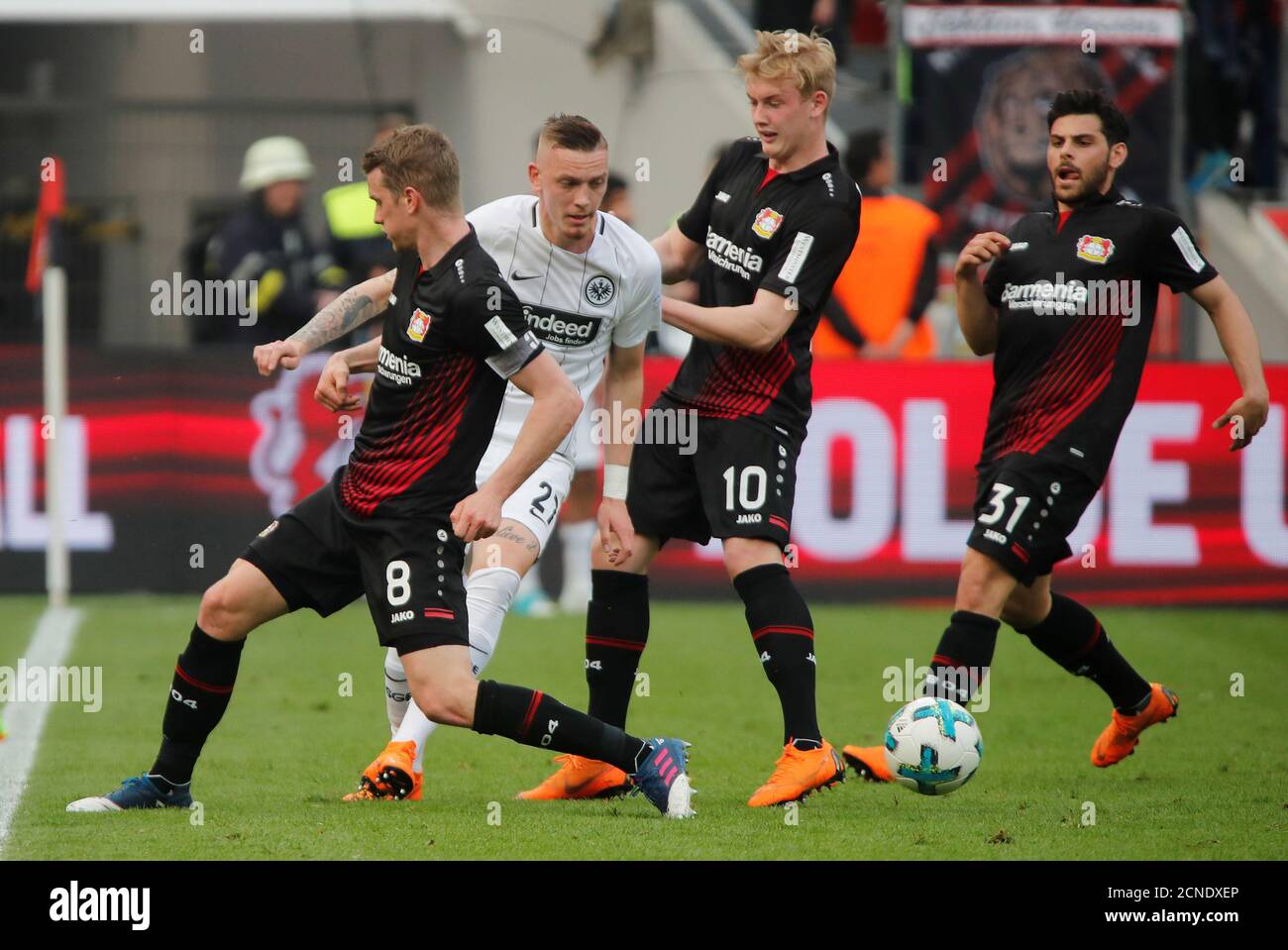 Soccer Football - Bundesliga - Bayer Leverkusen v Eintracht Frankfurt -  BayArena, Leverkusen, Germany - April 14, 2018 Bayer Leverkusen's Lars  Bender (L), Julian Brandt (2nd R) and Kevin Volland (R) in