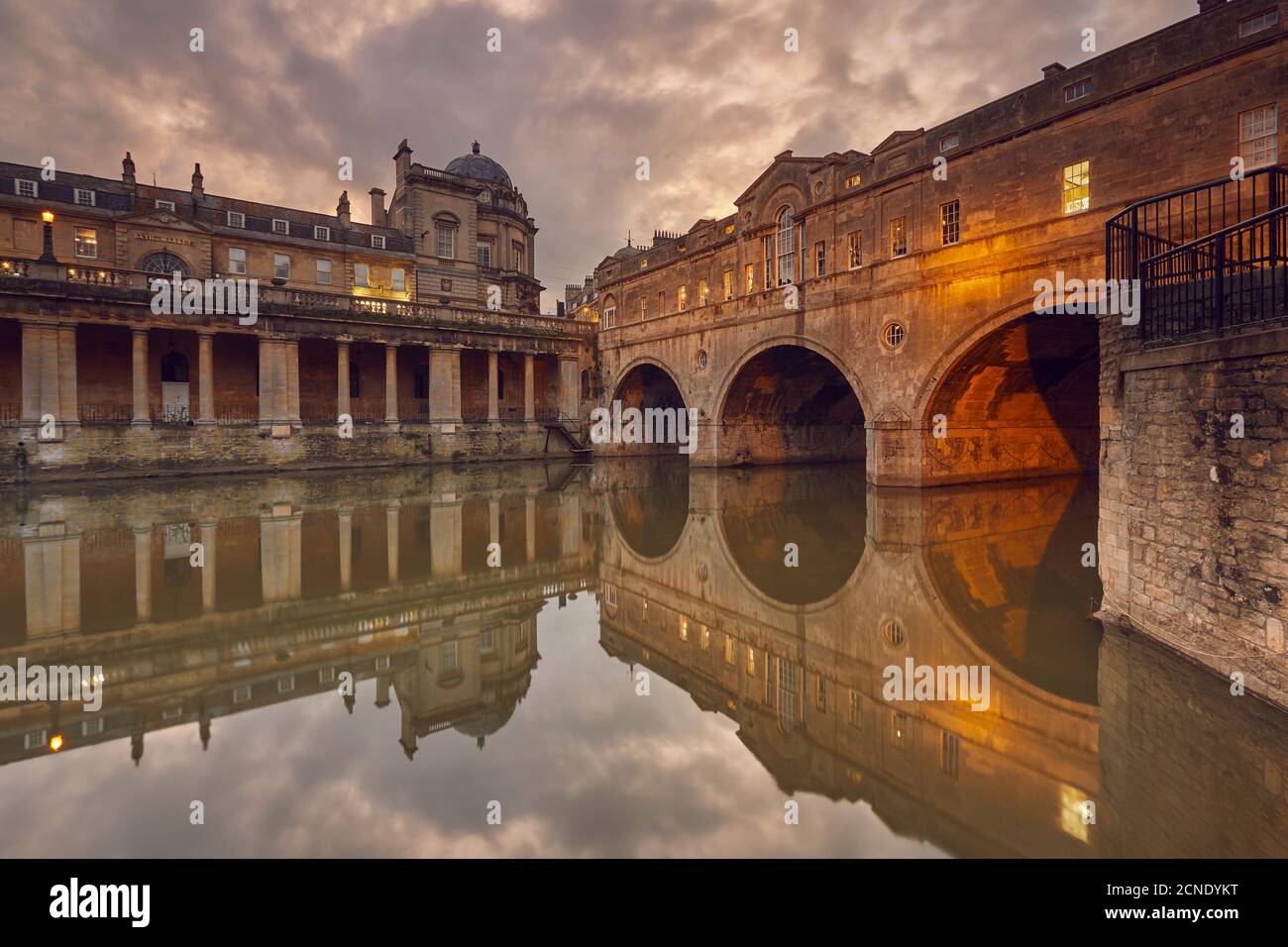 A dusk view of the unique 18th century Pulteney Bridge spanning the ...
