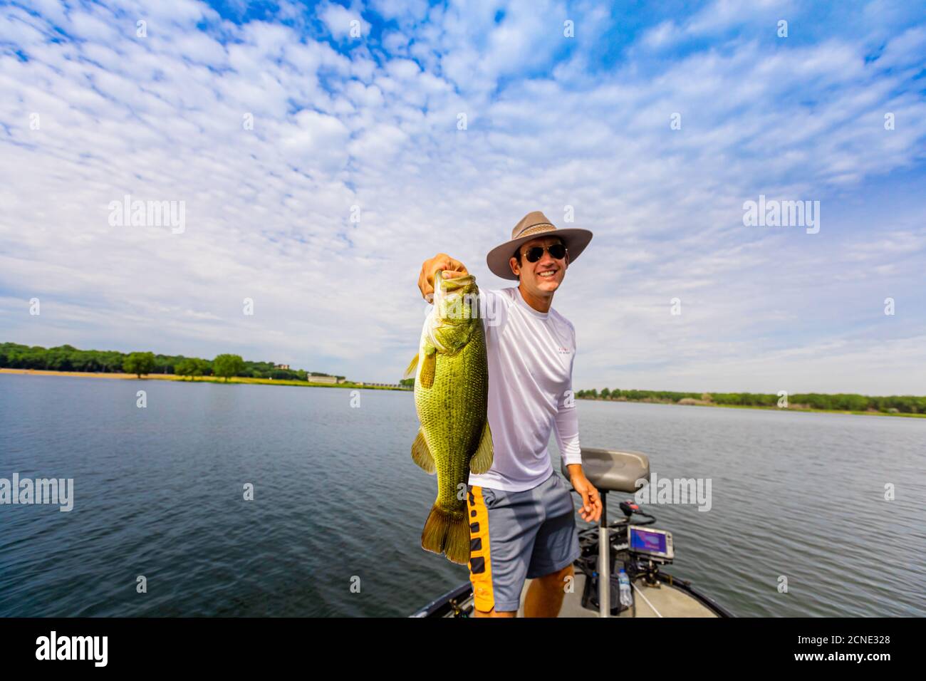 Man showing off his big catch of the day fishing on Yellowstone River, South Dakota, United States of America Stock Photo
