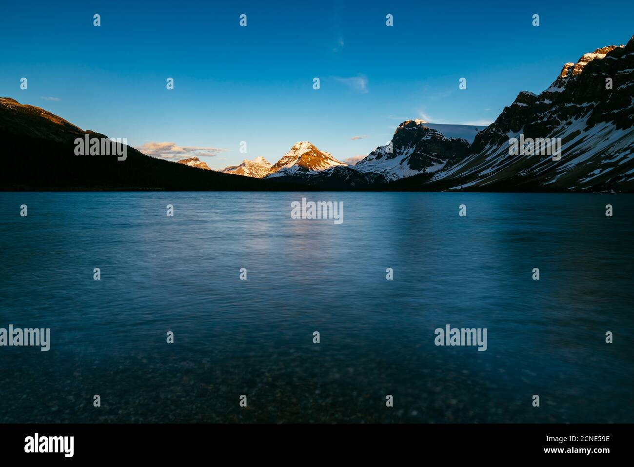Calm sunset at Bow Lake, Banff National Park, UNESCO World Heritage Site, Alberta, Canadian Rockies, Canada Stock Photo