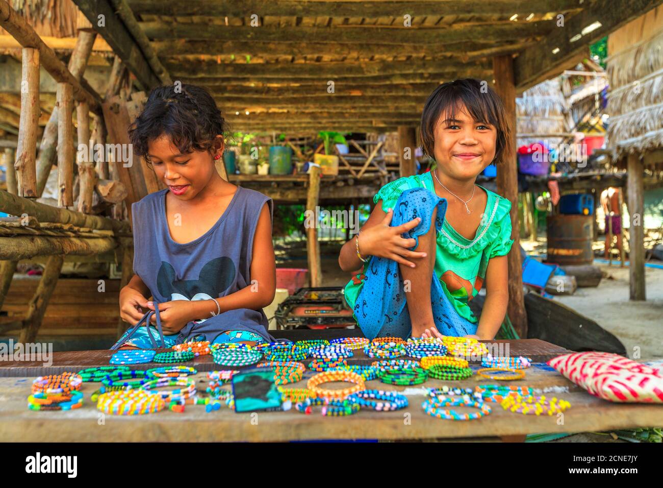 Sea Gypsies, little girls selling necklaces and bracelets in Moken tribe, fisherman village of Ko Surin Marine National Park, Surin Islands Stock Photo
