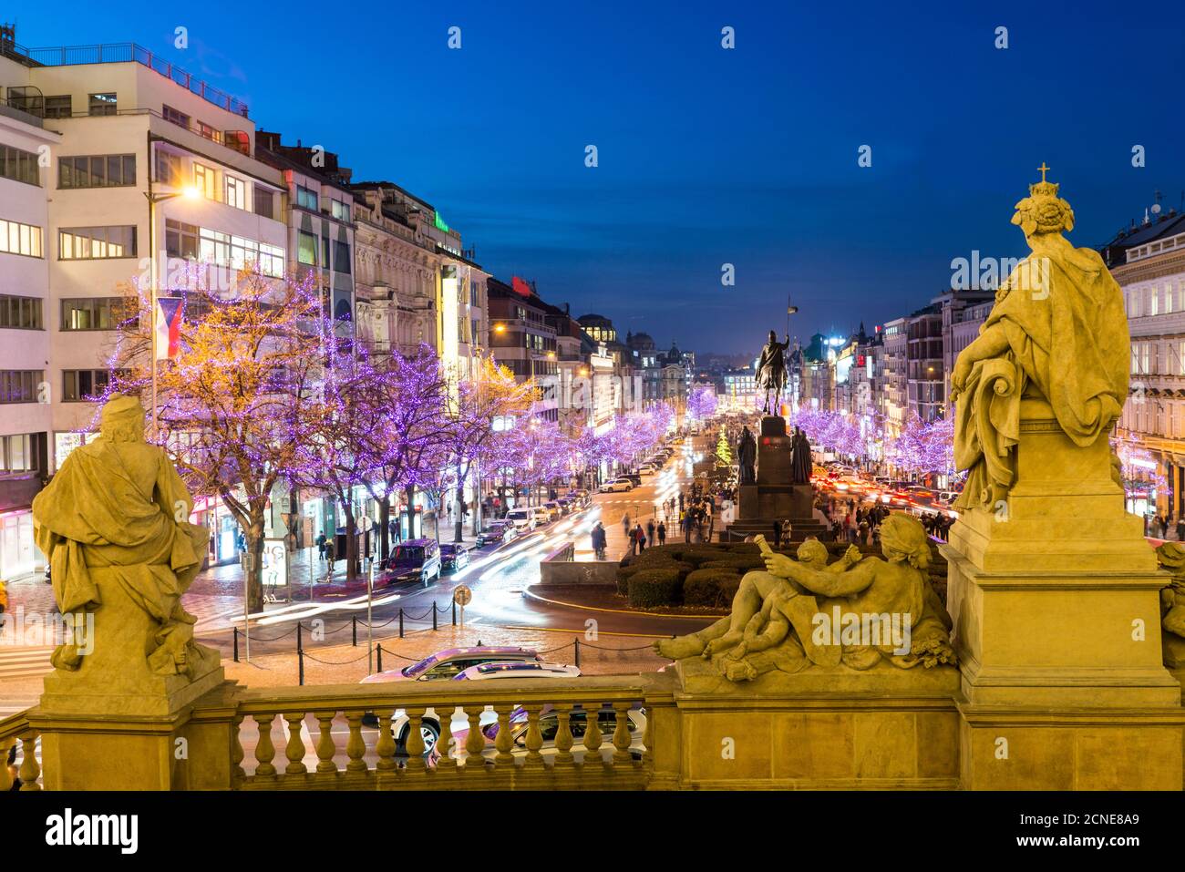 Christmas decorations and markets through statues of National Museum at Wenceslas Square, New Town, Prague, Czech Republic, Europe Stock Photo