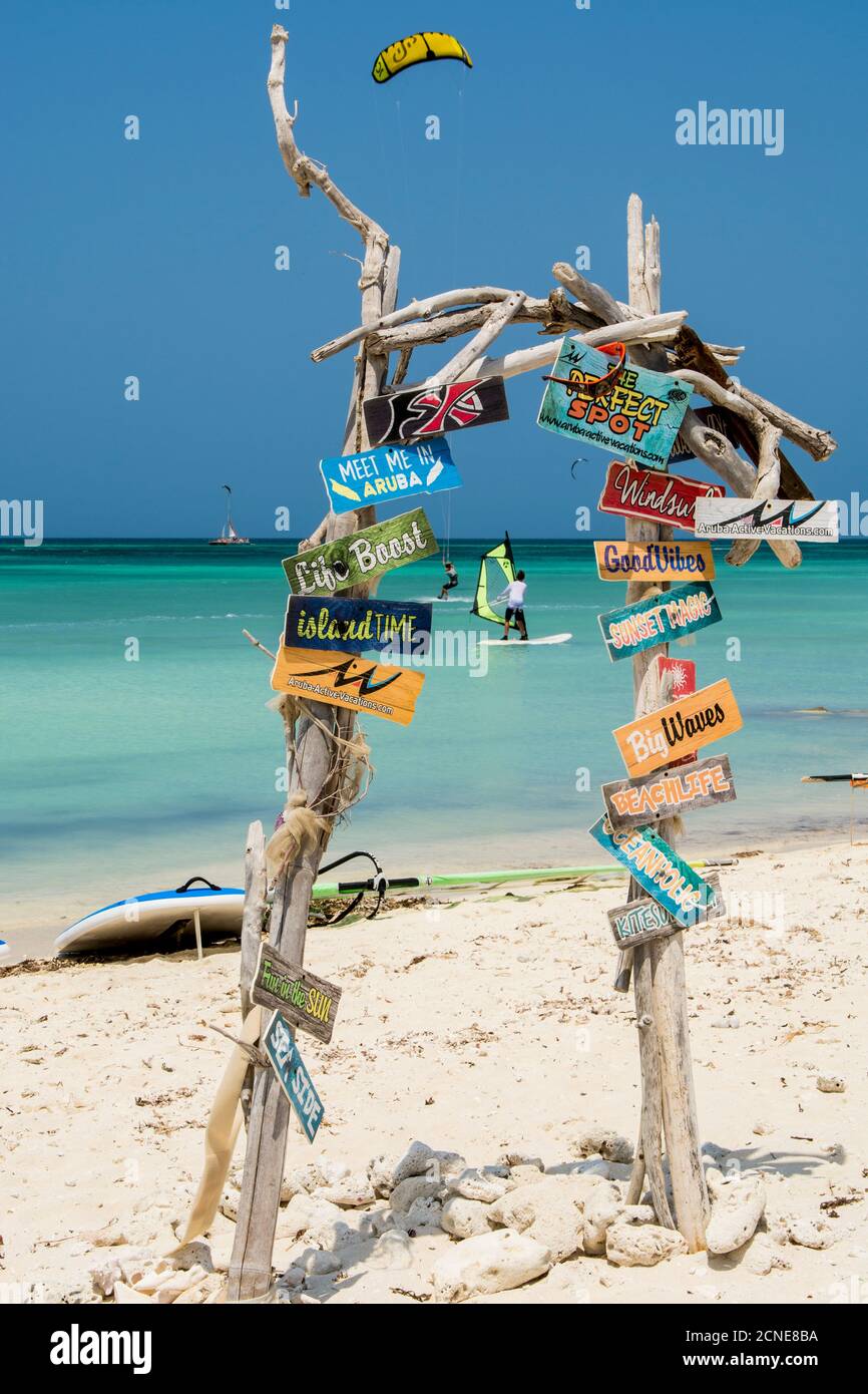 Windsurfing and signs at Hadicurari Beach, Aruba, ABC Islands, Dutch Antilles, Caribbean, Central America Stock Photo