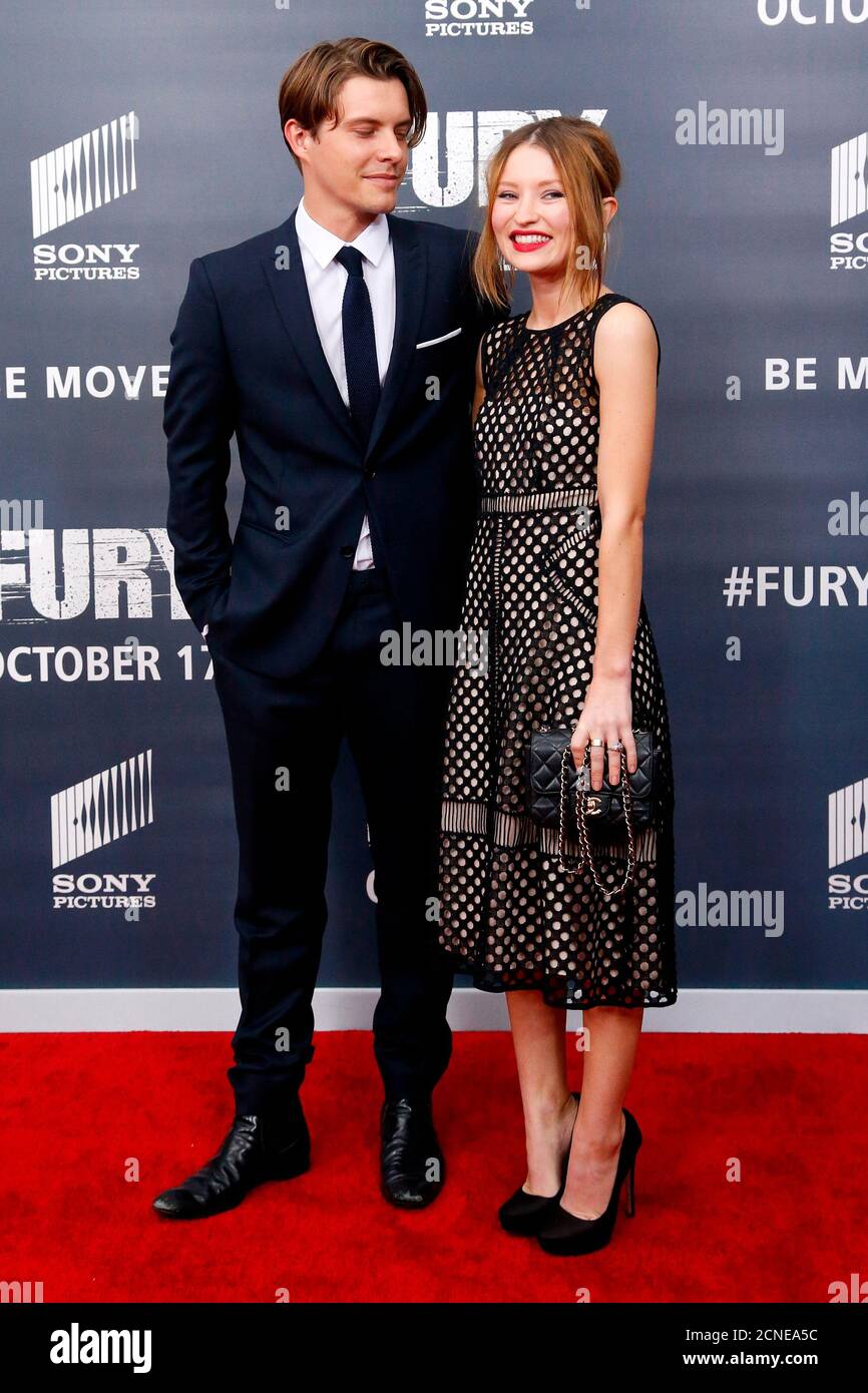 Actor Xavier Samuel Walks The Red Carpet With Actress Emily Browning At The Premiere Of World War Ii Film Fury At The Newseum In Washington October 15 2014 Reuters Jonathan Ernst United States