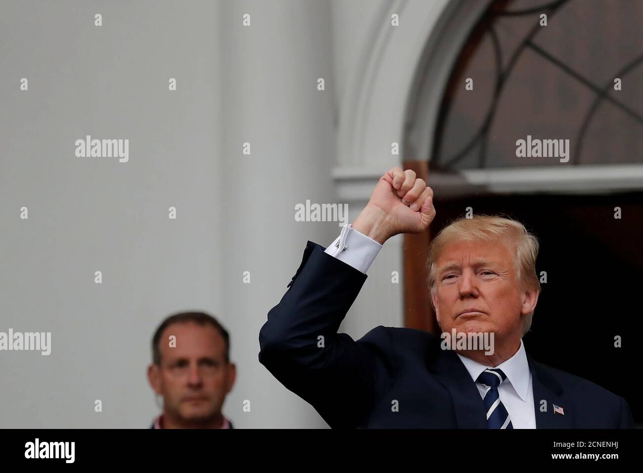 U.S. President Donald Trump reacts as he meets with supporters from a group called 'Bikers for Trump' at the Trump National Golf Club in Bedminster, New Jersey, U.S., August 11, 2018. REUTERS/Carlos Barria Stock Photo
